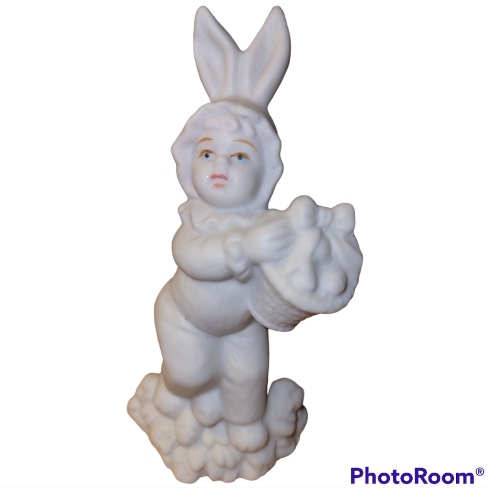 Porcelain Figurine of a Child in a Bunny Costume with a Easter Basket
